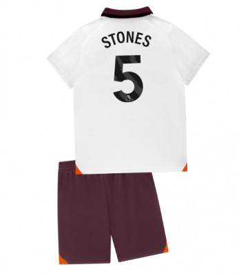 Manchester City John Stones #5 Segunda Equipación Niños 2023-24 Manga Corta (+ Pantalones cortos)